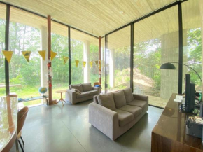 Light flooded architectural villa in the green